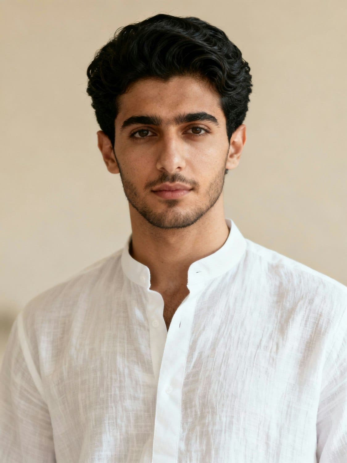 Tom Whitfield, project architect, in a white shirt against a plain background